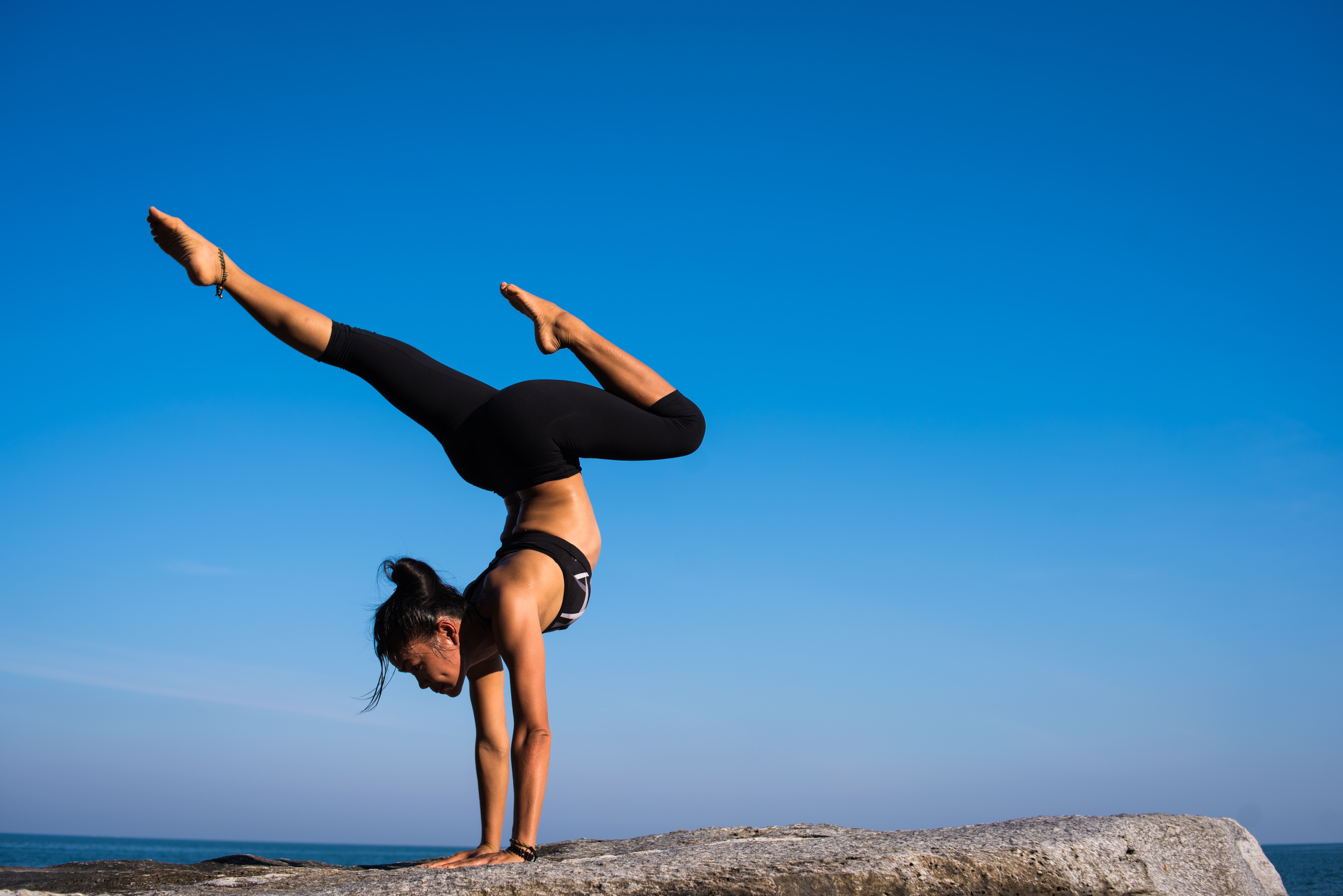 woman doing a yoga position